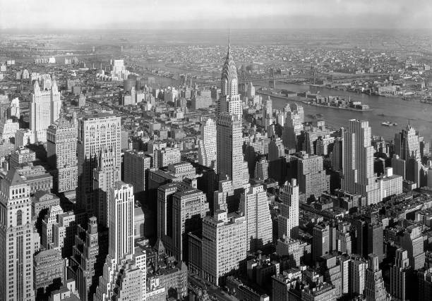 Chrysler Building and Cityscape Queensborough Bridge in Background New York City New York USA by Samuel H. Gottscho January 1932.