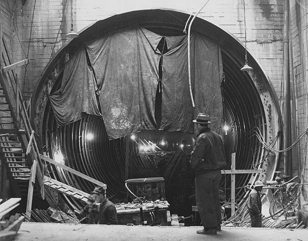 Construction workers in the Lincoln Tunnel connecting Weehawken New Jersey and the borough of Manhattan in New York City USA 14 December 1937.