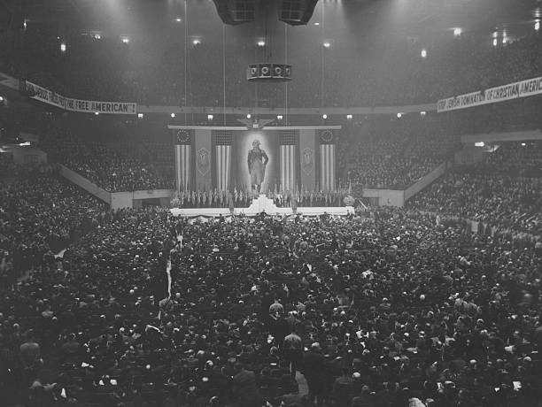 Flags swastikas and a portrait of George Washington at a meeting of the German American Bund held at Madison Square Garden New York City 20th