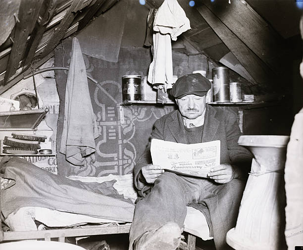 Homeless man in shantytown on West Houston Street.