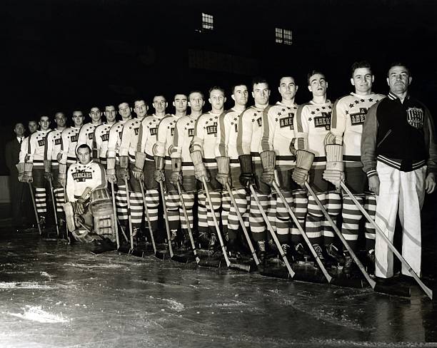 The New York Americans along with Mervin 'Red' Dutton 7th from the right pose for a team photo circa 1930's in New York New York.