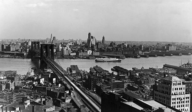 View of the Brooklyn Bridge as seen from the Municapal Building New York New York 1930s.
