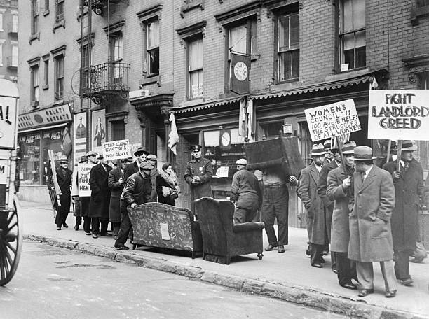 While tennants picketed and police watched the City Marshal evicted four households from Paradise alley colony at Avenue A and 11th Street. The