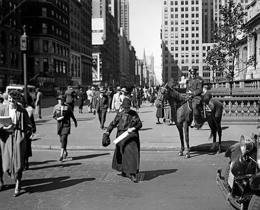 1930s MOUNTED POLICEMAN FIFTH AVENUE 42TH STREET WATCHES AS OLD WOMAN CROSSES THE STREET NEW YORK CITY USA