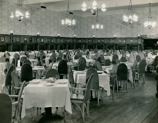 Black and whit photograph of interior of Jack Dempsey's Bar unoccupied.