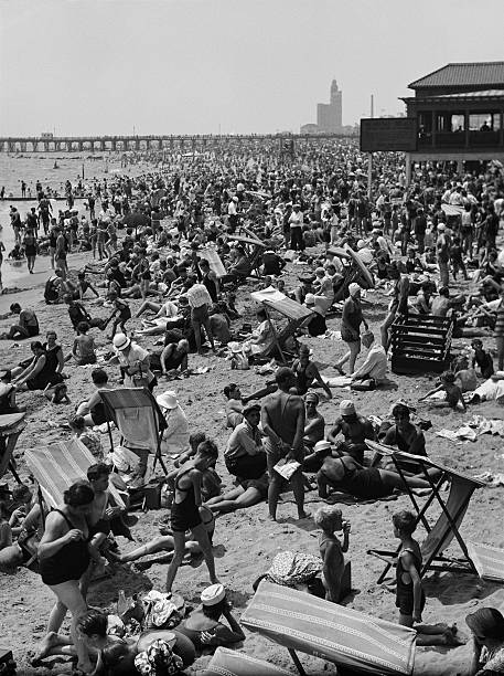 Crowd on the beach at Coney Island New York City New York circa 1930.