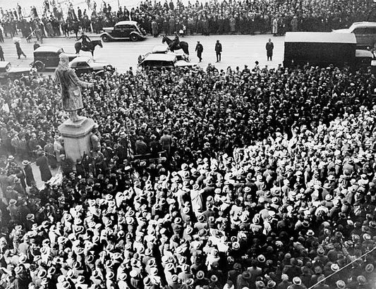 Crowds of Workers Progress Administration members march to City Hall. 10000 paraders held meeting in protest against layoffs of 40000.