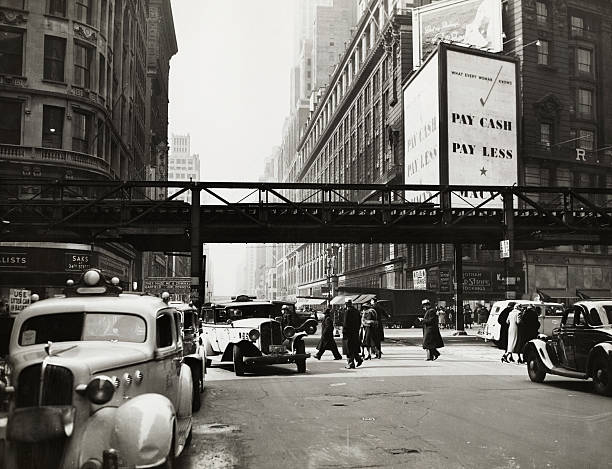 Elevated train tracks running past Macy's Department Store.