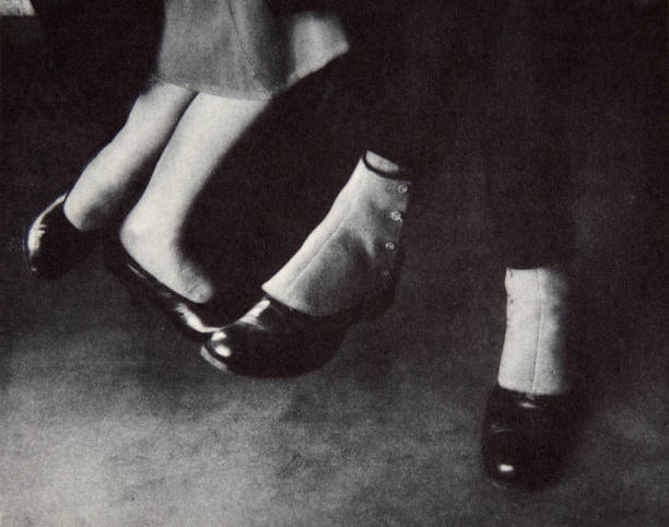 Feet of passengers on the New York subway USA early 1930s.