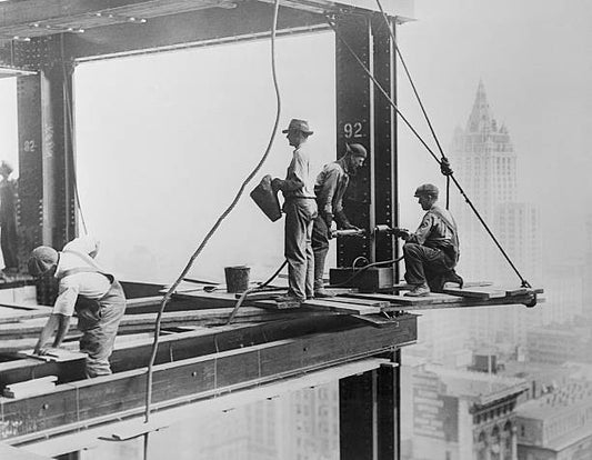 Flirting with danger is just routine work for the steel workers arranging the steel frame for the Empire State Building which will be the world's