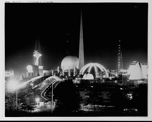 In Flushing Meadows Queens the grounds of the 1939 World's Fair are illuminated at night.