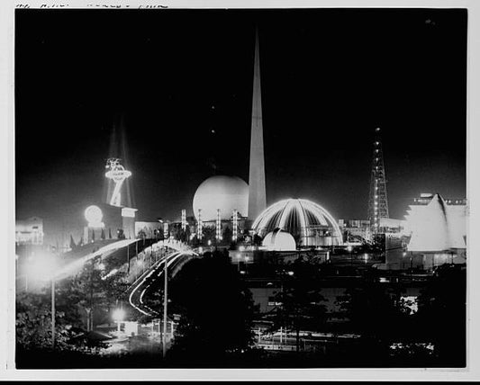 In Flushing Meadows Queens the grounds of the 1939 World's Fair are illuminated at night.