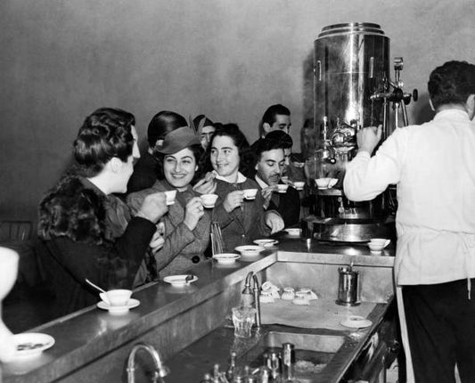 Italian students studying at Columbia University take a break from their books at a local espresso coffee bar New York New York 1939.