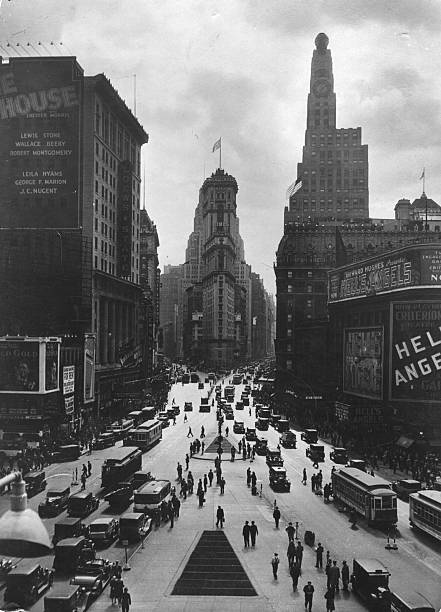 Looking towards the Times Building on Times Square the Paramount Building is on the right and Seventh Avenue on the left crossing Broadway.