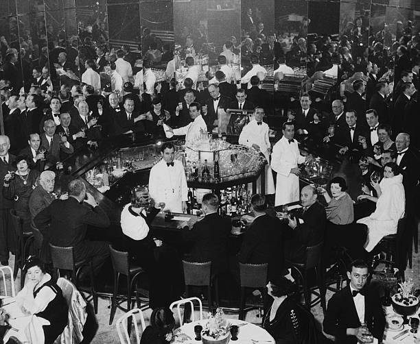 Men and women crowd a fancy club on Park Avenue to celebrate the end of Prohibition.
