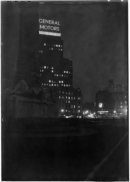 New York City views. Columbus Circle. Base of monument &amp; General Motors building at night. General Electric Building