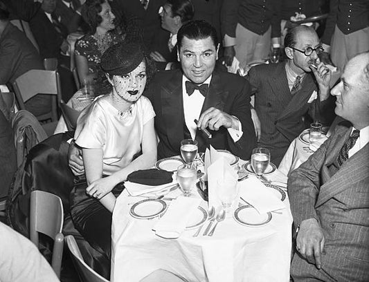 New York NY- Jack Dempsey former heavyweight champion and Mrs. Dempsey the former Hannah Williams pictured as they attended the opening of