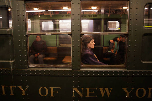 People wait for a vintage R1 New York City Subway car which was manufactured in the 1930s to pull out of the the 2nd Ave. Station November 30 2008