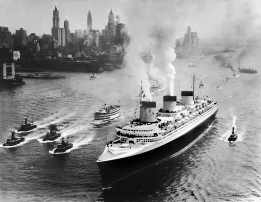 The French transatlantic ocean liner SS Normandie arriving in New York harbor. The ship was launched in 1932 from Saint-Nazaire by the Transatlantic
