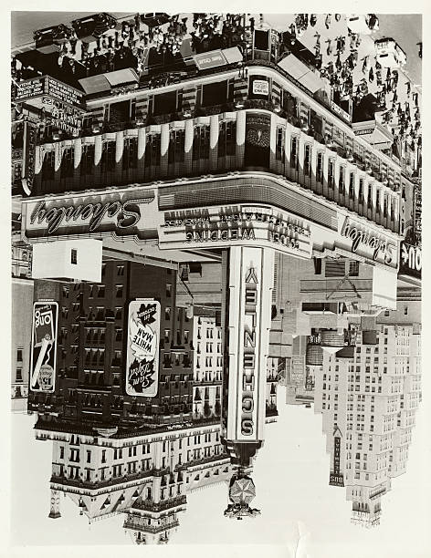 The Rialto Building on the corner of 42nd Street and 7th Avenue topped with an enormous Schenley Whiskey sign.