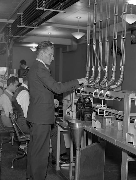 This is one of a series of photographs revealing that complicated machinery of the New York Stock Exchange and how it is set in motion by even the