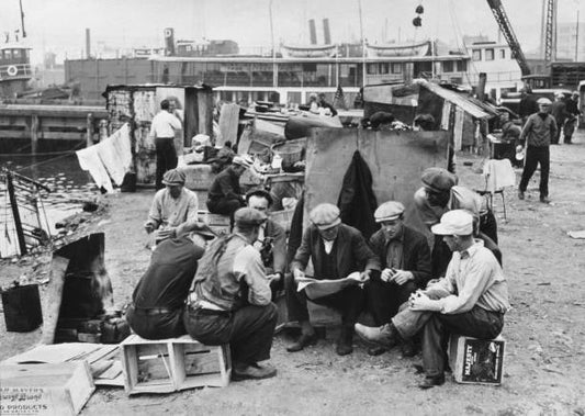 Unemployed squatters at the Hard Luck Camp at the foot of 9th and 10th Streets and the East River in New York City waiting for eviction by the