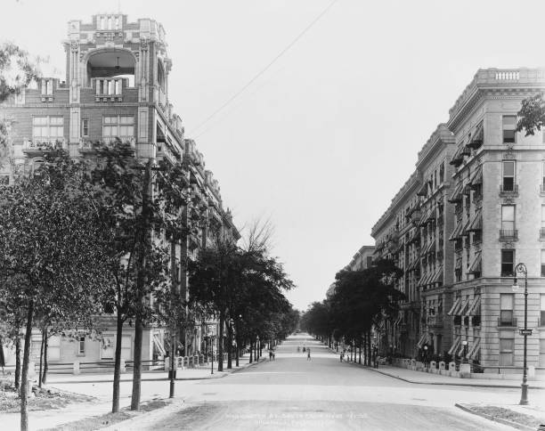 View down a tree-lined Washington Avenue looking south from 181st Street West in The Bronx New York City New York circa 1935.