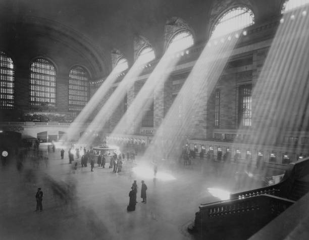 View of rays of light in Grand Central Station New York New York circa 1930.